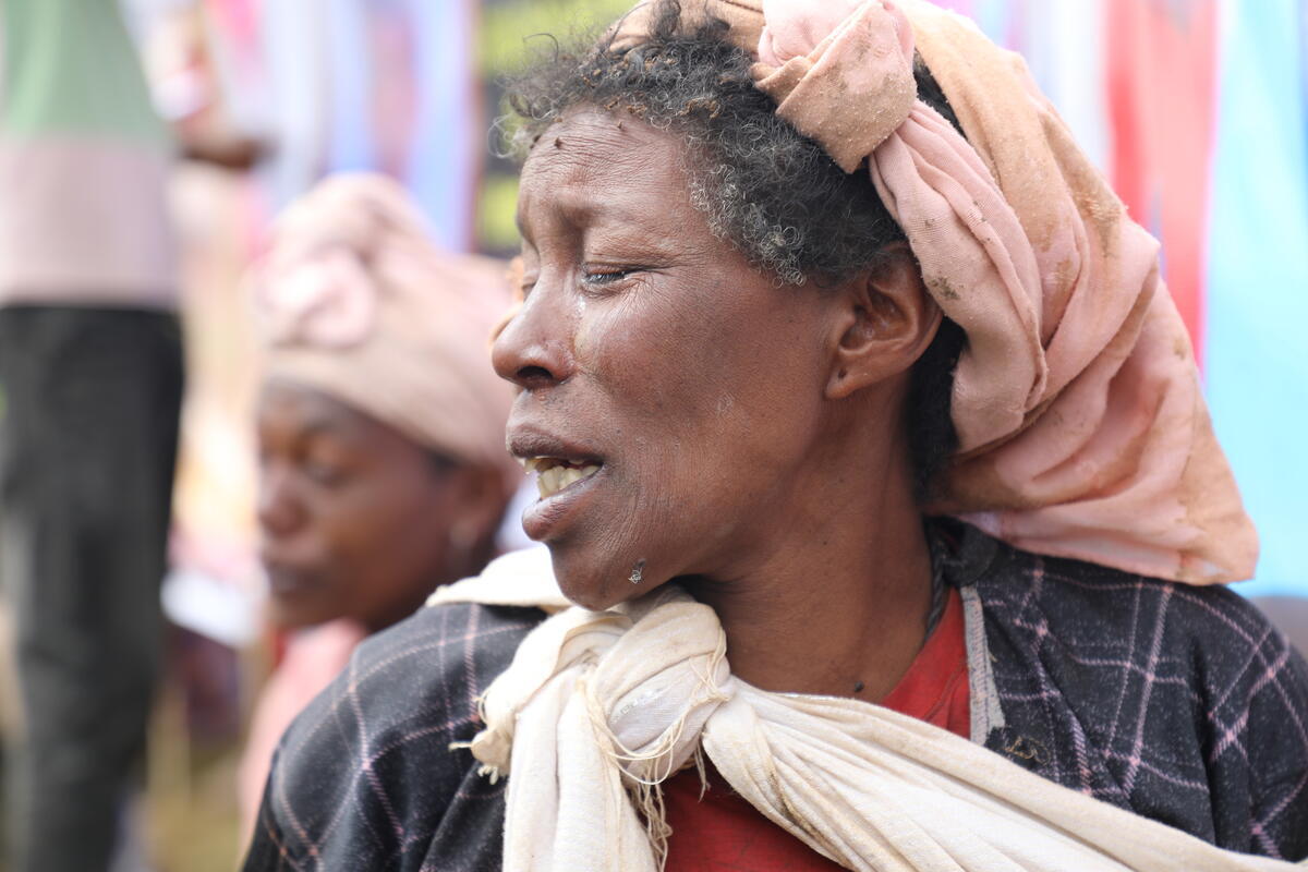 Landslide in Ethiopia relatives comforting the mother of the lost children in a mourning site.