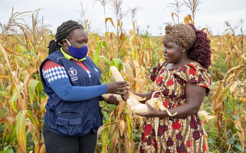 Maria, right, lives in Villa del Rosario, Colombia with two of her children. She has relied on food vouchers from World Vision to survive since fleeing hunger in Venezuela. Photo: Chris Huber