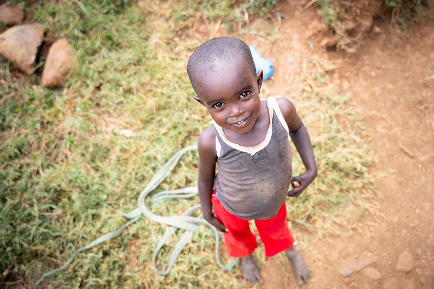 A child smiles.