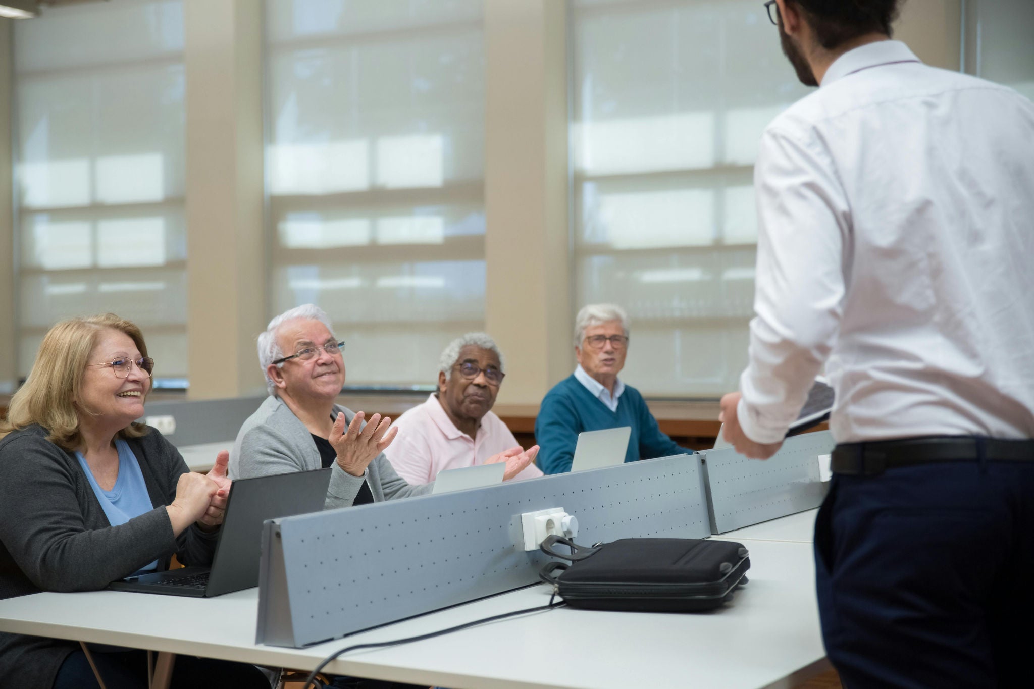 A group of adult learners participates in an interactive workshop, reflecting the value of lifelong learning in fostering skills, confidence, and community connection. Opportunities like these empower people of all ages to keep growing personally and professionally.  (Photo credit: Kampus / Pexels). 