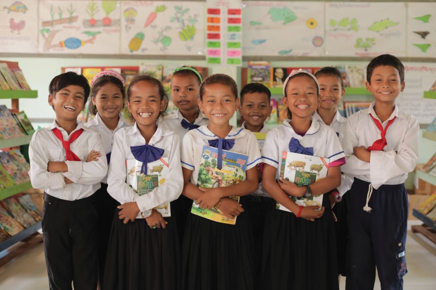 Students Holding Their Books Together