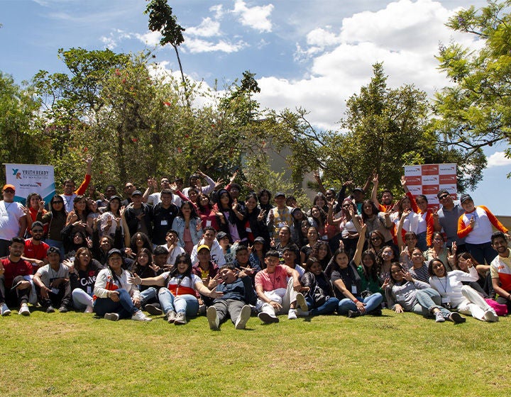 Youth Ready participants in Ecuador smile brightly after completing a session.