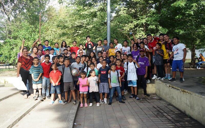 In Honduras, children from Peace Clubs stand together for a group photo.