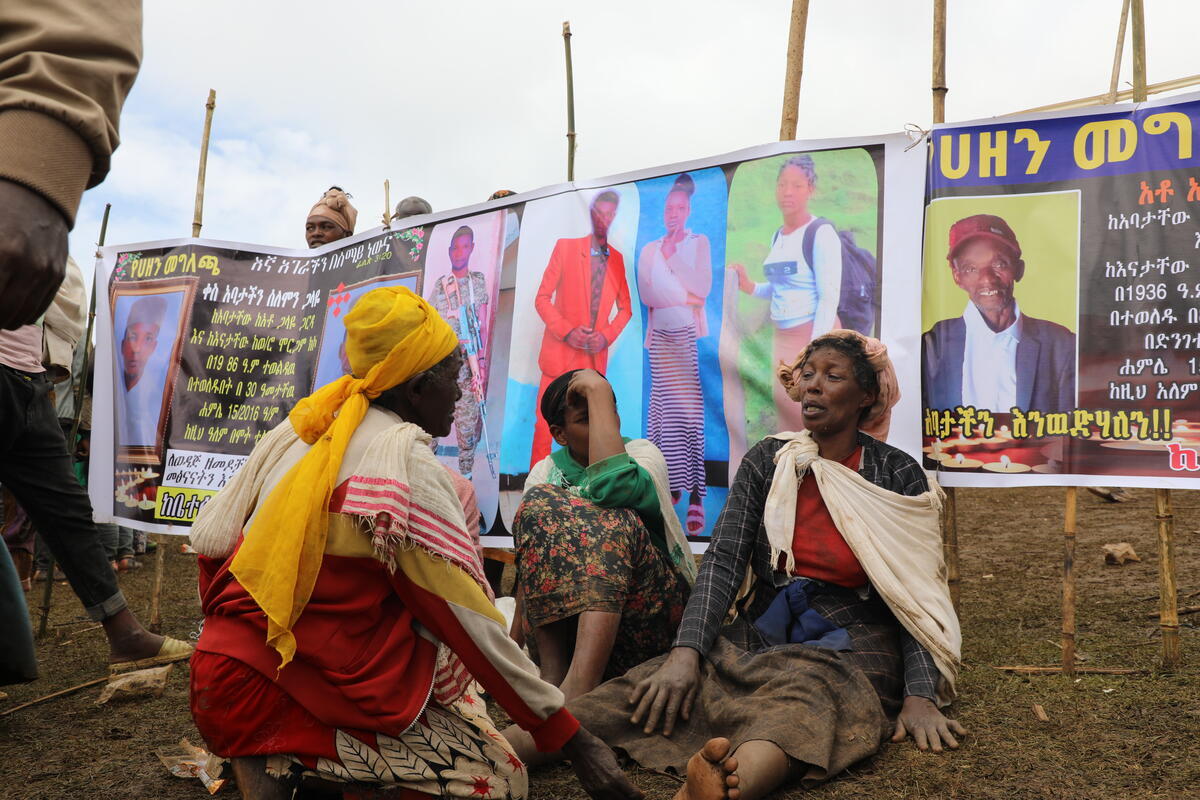 The mother on the right lost five children in the series of massive landslides. 