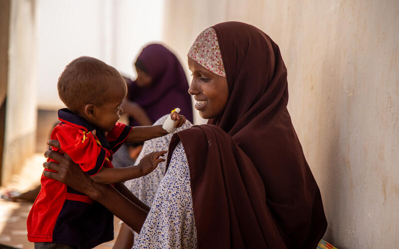 In Somalia Internally Displaced Person's camps, the burden of retrieving and carrying water often lies with the women and girls of the community. 